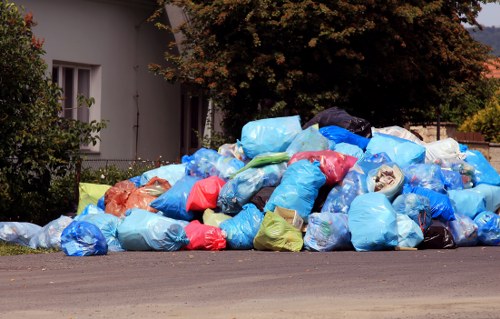 Workers clearing construction waste in Hackney