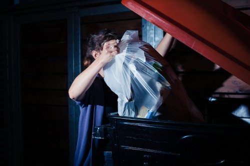 Efficient clearance crew organizing items for disposal